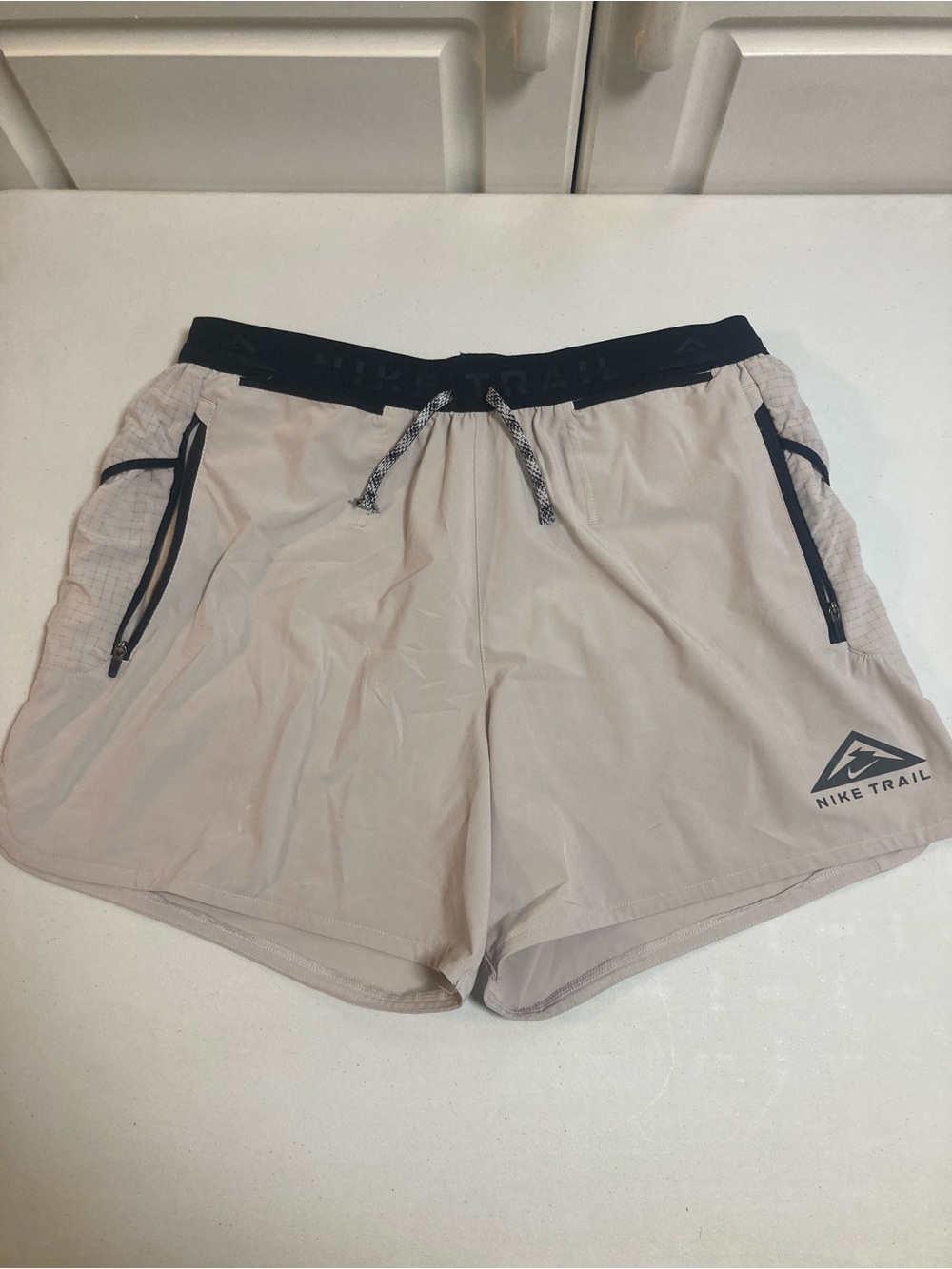Nike Men’s Trail Shorts in Light Beige with Black Waistband